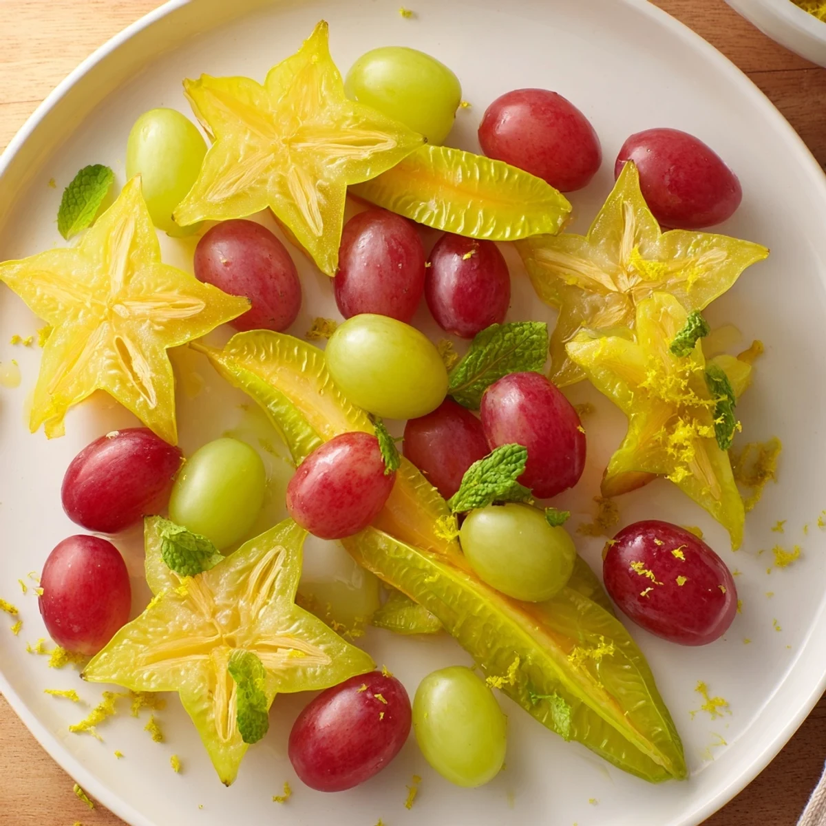Sliced starfruit and grapes garnish: A bright, colorful display of fresh brunch fruit.