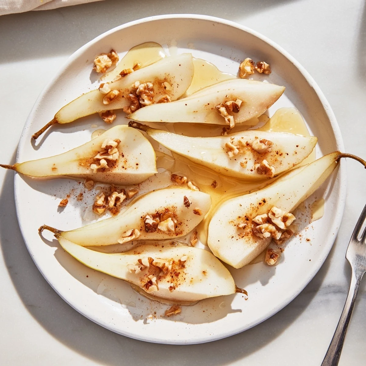 Golden honey glistening over juicy pear slices, a delightful snack sensation.