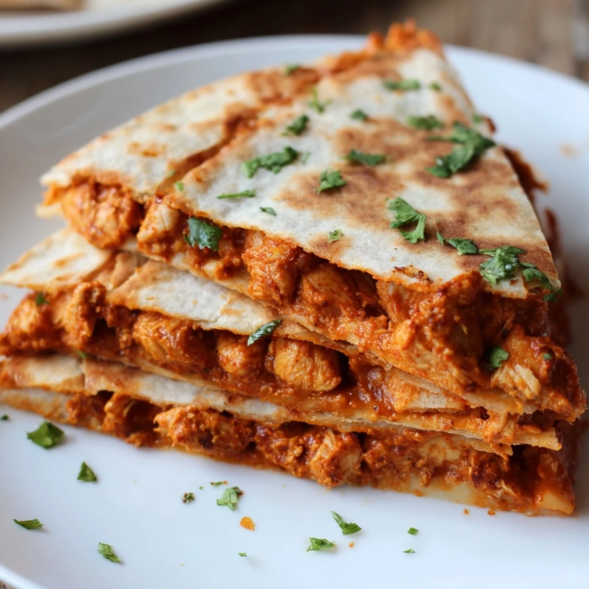 Mouthwatering Butter Chicken Quesadillas ready to be served, a comforting blend of flavors and textures.