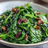 Zesty arugula salad tossed in homemade lemon vinaigrette, topped with delicate Parmesan shavings and crunchy toasted pine nuts.