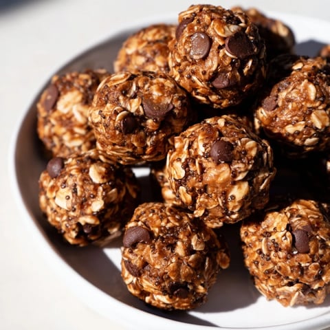 Chewy almond-chia energy bites, showing a close-up of the delicious ingredients and textures.