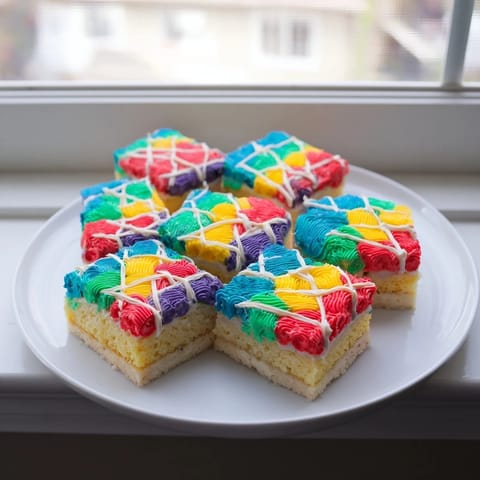 Imagine the soft, colorful layers of this delicious Cozy Quilt Patchwork Cake, perfect for a celebration.