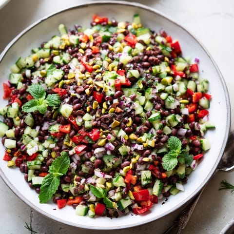 Top-down view of the colorful Dense Bean Salad with Dubai Chocolate Notes, showcasing a mix of textures.