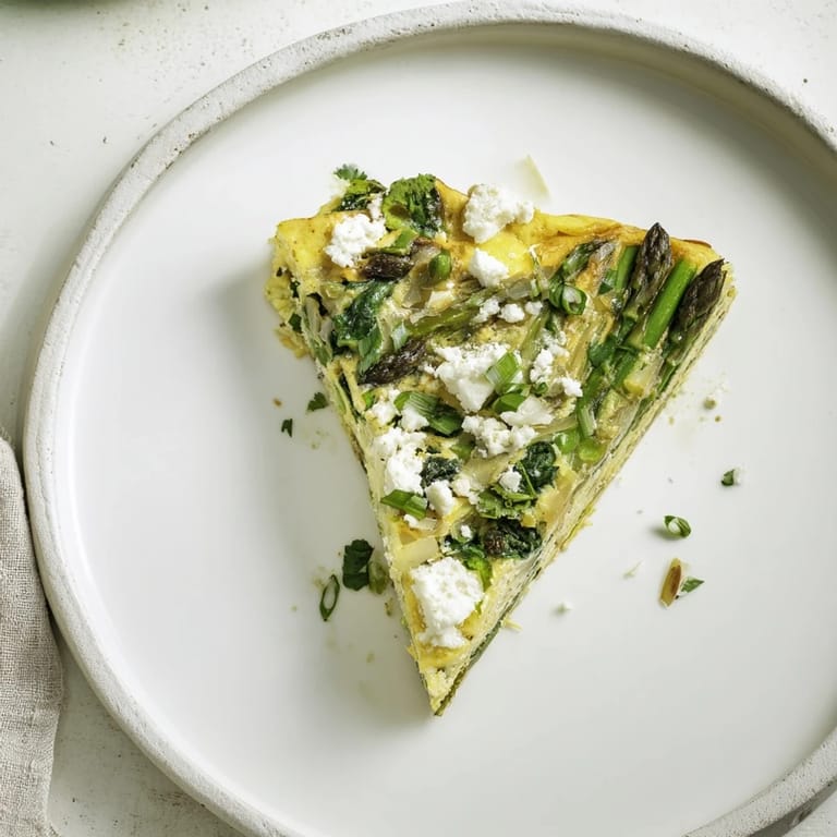 Savory and comforting: a delicious Meadow-Soft Cozy Plate: Frittata featuring healthy spring vegetables.