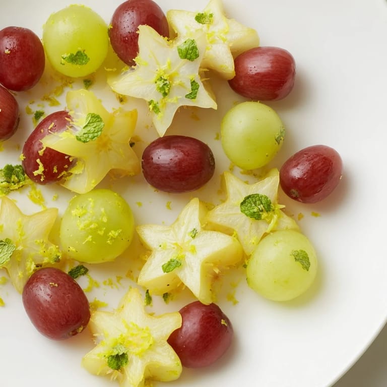 Refreshing starfruit and grape garnish, ready to boost your brunch with vibrant flavor.