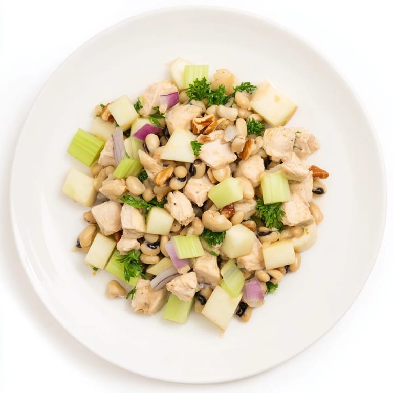 Fresh, crisp apples complement tender chicken in this festive Chicken and Apple New Years Luck Salad, ready to enjoy.