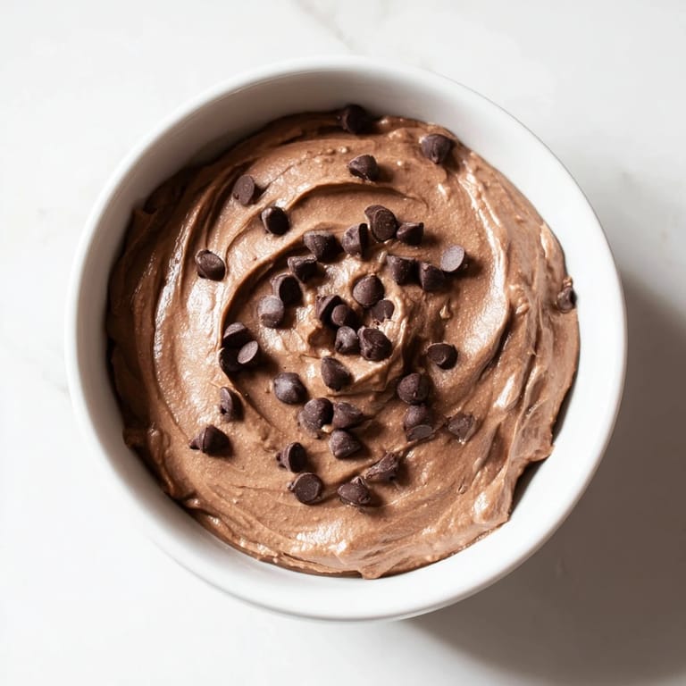 Close-up of a sweet and satisfying chocolate hummus, ideal for a vegan dessert or snack.